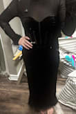 I love this dress! It feels sophisticated but sexy at the same time. I like the fit for someone who is shorter like me because it still fit well in all the right places! I would say if was true to size, its tighter around the waist and hugs the curves without feeling restrictive, so I can still dance! - Kelly S.