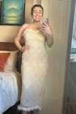 Loved the feather detail but ended up going with a sparklier dress for my birthday party! - Sarah M.