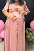 Wore this for my baby shower. Color is as pictured. Fabric is thick and hangs beautifully. Top part does not stay closed with tiny button but a pin works. I do own this dress in yellow and when I was not pregnant I sized down. Ordered this as a gift for my sister in sage and can't wait to gift it. - Jade G.
