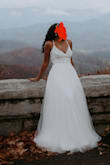 The dress was a perfect length talk girl friendly. It is adjustable so you can tighten it or loosen it as much as you would like! - Genesis B.