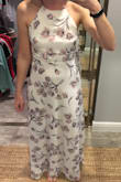 Love the dress simply for being long enough! Planning on wearing flats with it for my wedding rehearsal. Not sure if it's long enough for heels. Only complaint is the top pokes out a little around the chest. Possibly because I don't have enough up there to fill it out?? Also the dress runs a size small. I bought a medium but honestly a large may have been better (besides the filling out the top part). - Amy L.