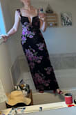 This was the most beautiful dress! It's classy, yet tastefully sexy. I unfortunately had to return it because I couldn't get it to zip entirely (big bust girl) and there was no give in the fabric. I plan to order the next size up for our formal next year, if it's still available. - Melanie G.