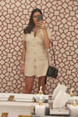 Bought this for engagement photos and have worn it out to dinner. True to size small and was not super tight (I'd compare to A&F sizing). The length was a bit shorter than I'd like but, being taller, that is a given. What emphasized it is that the hips flare out a lot on this dress. That's why I took a star off. I found the flare to be the slightest bit unflattering but not enough to return it. Many compliments and very classy dress. - Brittany C.