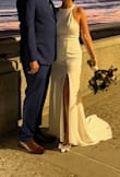This dress is beautiful and almost fit perfectly. The only alterations I had to have was it was too long. Kept the girls in place. - Sarah S.