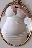 I love it! The zipper does not bunch up and it is very form fitting. Straps are a little long but I'm getting them adjusted to wear without a bra. Fabric is a bit unforgiving with shapewear but I will look for something more seamless. I can't wait to wear it! - DEMETER B.