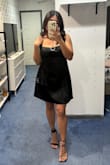 It's a really cute dress and has good material. Unfortunately, i'm on the shorter side (5'3), and has a short torso. The top half of the dress is too long on me. I also probably could've sized down... - Heidee S.