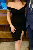 Nice thick material hugs in all the right places. The straps are comfortable and the dress did not feel like it was falling down or riding up too much. I did wear with shapewear for my comfort but it is very flattering either way! - Melissa L.