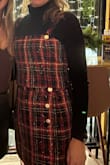 I wore this too with the matching skirt with a black turtleneck underneath for my holiday party. It was great. It also looks super cute with a pair of jeans tho. Fabric is thick and good quality. What you can't see in the picture is there are some sparkles on it. - Karyn M.