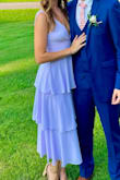 I have worn this to several weddings and I always feel so beautiful in it and get lots of compliments! It fits like a glove and has enough movement to allow me to dance! 10/10 recommend this dress!! - Emma B.