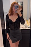 I absolutely love this skort. It's so cute and so comfortable. It does not have too much stretch to it but fits me really well. I can't wait to wear it out! - Jordan C.