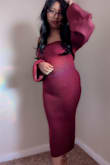 I maybe should have sized up to a small. But I'm still happy with this dress, it's a deep red and so pretty! - Erika H.