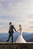 Worked perfectly for a winter outdoor elopement! As others mention, the upper arms are a bit tight at first try-on, but they loosened and stretched after trying it on a few more times & was not a big issue. Overall very happy with it! - Megan M.