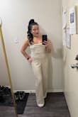Jumpsuit is gorgeous and fits my bust and torso perfectly. I did need to get it altered in the crotch and pant legs because I'm not tall. - Kimberley J.
