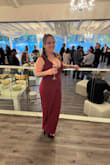 I absolutely loved this jumpsuit! The color, style and material were great. Unfortunately, I am not very tall (I knew this would be too long when I ordered). I did hem the bottoms and cut the straps to shorten the length and sewed them together and it worked out! My only complaint was it was hard to zip up and needed help throughout the night lol. - Heather C.