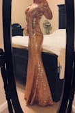 It fits perfect except for the length, just a bit too long (I am 5'3"), so I'll have to have it hemmed.......probably only a half an inch because I am wearing 4 inch heels. The color is beautiful! I can't wait for New Year's Eve!! - Diane B.