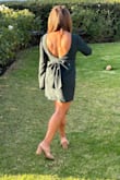 Such a unique piece! Compliments from everyone, fit so good, I thought it was a little tight at first but it was just a funky zipper. Once it was on I was obsessed. I'm always a medium in Lulus and this was a true M. So flattering and I didn't even need a bra! The dress fit snugly enough to keep them in place all night. Super comfortable and not too short, classy but sexy! - Daniela B.