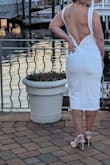 I loved the back on this dress and thought it would be perfect for my courthouse wedding. It worked out great, but this dress is not forgiving so choose your undergarments wisely. I got a small, which fit well as the fabric is stretchy, but the fabric is thin and colors will show through. - Sherry H.