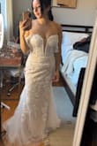 I didn't end up going with this but it's definitely a beautiful dress. I'm not sure it was very flattering on my body type but probably very pretty on someone more hourglass shaped - Nancy C.