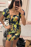 I loved the dress design and colors but it feels a little tight for me. I don't know if I'll return it because it feels a little tight and short to wear to formal events. - Pilar L.