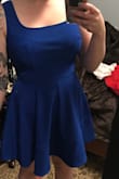 The dress looks small and I was scared it wouldn't zip, but when I put it on, it hugged my curves perfectly, and zipped right up. It's perfect on and I couldn't be happier!! The flare of the skirt is super cute too! - Miranda S.