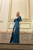 I was surprised about how large it ran. I returned the medium and ordered a size down (small) and it was perfect. I'm 5'9 and the length was great with heels. Had a bit of weight to it. Didn't feel cheap at all. I received so many compliments. Lulus came through for me again! - Jenny Z.