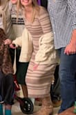 This fit me very well, past knee & fit nice on top, too! Cute neckline and even decent arm length for a tall gal! - Megan T.