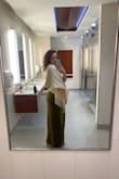 I am 5'8" 150 lbs, athletic build and I ordered a medium and a small. I'm so glad I did because the small fit much better! Fabric is stretchy and comfortable and the style is flattering to all body shapes. The bust runs large but a few pieces of fashion tape kept it in place. The length was perfect with heels. Got lots of compliments; so worth it! - Tia C.