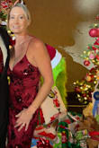 I don't usually wear red, but I needed a red dress for a Christmas Gala event. This dress was beautiful and just the right shade of red. Not too bright and the flowers really added a nice element. The dress was very comfortable and easy to move in. I received many compliments and would definitely wear this dress again. - Samantha G.
