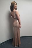 I ordered this dress to perform in on stage  (I'm a singer) and it really stood out. I received numerous compliments. It's tight but figure flattering, and I felt so glamorous in it. It didn't work right with a backless bra converter, so I wore a strapless and tucked the straps into the cups. The dress held the bra in place perfectly. Love the color and the shimmer of it. Beautiful dress! - Robyn G.