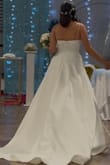 Definitely the dress of my dreams! I loved the design, the fabric, the quality everything is perfect! It fits me perfectly, with delicate and flawless details. The way the dress flows is sensational very elegant and understated, beautiful and perfect for the best day of my life! - Lizeth M.