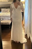 This dress is beautiful, but it's a little too big on the top area as it's all open back. It was also just a little too short when wearing heels for my liking. - Elizabeth O.
