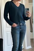 I like the color and the length of the sleeves of the sweater, as well as the fact that it's not secretly cropped in length, but a regular length that keeps you covered in midrise jeans. I like the fact that, even though it looks like it may be made of a heavier material, it's actually very light, thin, airy and really great for warmer temperatures in the autumn and winter that may come up but would also be a great base layer. - Carley Q.