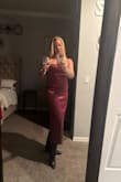 It's a true fit to size and extremely comfortable. The color is vibrant and the material is of great quality. The skirt is lined and the corset top has lots of stretch. What I love the most is that not only does it look good together, each piece is versatile to wear with other items. I loved it so much, I purchased it in ivory also. - Zanoni Q.