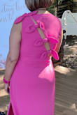 Love the dress! It was too long on me, but that was expected because I am short. The dress has stretch, it didn't fit tight on me which I liked. Wore it for my daughter's bridal shower and got lots of compliments. - Isabel M.