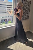 This dress fit pretty well. The rib cage area was tight, almost couldn't get it zipped, even though I have a very flat chest. The length was perfect for me even with 2 inch heels. - Kari S.
