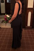I am in love with this dress! It is exactly what I envisioned for my bridesmaid dress for my cousin's wedding. I read a bunch of reviews and they influenced me to size up to a large. I am completely in between sizes but reviewers said it was tight. So I had it taken it a few inches where it gapped in the arm pit area. It now is perfect! - Stephanie Z.