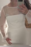 It fit great from the waist down because I chatted with a fit representative. But it sat really low so I'm going to have to get it altered. That is the only problem, other than that it's beautiful. - Tania G.