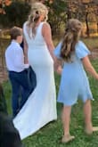 This dress was absolutely what I was looking for! Its classic silhouette was perfect for our outside fall wedding and was absolutely stunning in person! We had our children in our wedding and the dress was extremely comfortable (it had some stretch) and allowed me to move freely with them. I highly recommend this dress! I received so many compliments! - Megan C.