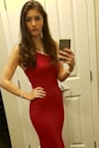 I absolutely love this dress! I was in between sizes XS and S. I am smaller up top so I'm glad I went with the XS. The dress was a bit tight in the hips but not too tight- figure hugging- I expected this based on the size cart. Great material and quality. I needed to have the dress hemmed, but this is typical when I buy long dresses. I specifically had the back of the dress left longer and loved how it looked Overall, amazing dress and it does run true to size. Can't wait to where it again! - Ashley H.
