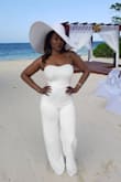 My bra size is 34G. It wasn't an option on the drop-down *side-eye*. Anyway, girl... I ordered this jumpsuit 3 days before my bff's all-white destination wedding to Jamaica--which was completely irresponsible for the way my height and bust size are set up--but Lulu's got it to me with a day to spare. Fast forward to wedding day, the guests were all about the bride and this jumpsuit. The bride was all about this jumpsuit. This jumpsuit received a record number of likes on Instagram (and I've posted some serious accomplishments before) and finally got me the "hey big head" text from my ex that I've been passive aggressively striving for. I wore it with flip-flops and it didn't drag the floor, it was loose but controlled my tummy (yes, it's in there), the top didn't slide down and expose my strapless bra, I felt cool on that hot a** Jamaican beach, and the stretch allowed me to drop it low at the reception. Oh, and I got red lipstick and brown makeup all over it and it washed right out. The size chart works. Buy. It. - Noelle S.