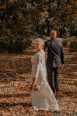 I got so many compliments on this dress. If you are short like me, you will have to alter it. I had the sleeves shortened too. Very comfortable. I have loved it more if the back was high and not a v. With the buttons. I added a beaded belt from Etsy to match my headpiece. - Denise P.
