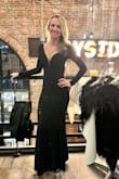 I fell in love with this dress when I saw it online so I didn't want to get my hopes up that it would fit perfectly. But it absolutely did! Fit like a glove! I bought it for a formal New Year's Eve wedding and I got SO many compliments all night long! As well as on these pics I posted to fb afterward. Plus, I snagged it while it was on sale so that was a plus.
The one caveat you should plan for which I was totally forewarned by reading the reviews is that the sparkles do shed like crazy. However, I read one reviewer simply said to wash it and that did the trick for her so I tried that as well and it definitely worked! Not to say that it didn't still shed a little bit but significantly less. I was a bit nervous about it because you have to hand wash it and, while wet, the black sparkles were all over my hands and bathtub. But when it finished drying (or just about) I shook it out and also threw it in the dryer for like 5 -10 mins with a towel to try to get off any remaining loose sparkles. - Lindsay G.