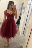 This dress is so adorable! I can only give 4 stars, however, as the bust is pretty large for a smaller chested person. Will definitely need either boob tape or to have the straps shortened before wearing. - Holly S.