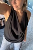 Wore this twice already to two different event and I got so many compliments each time. It is long enough for me and I always have to buy long length pants. I'd say these are 34-36" long. Great for tall women. I wish I had a pic of how they lay at the floor. Ignore the stuff in my pocket! - Serena O.