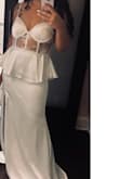 Beautiful dress, beautiful material, felt like thick silk. Very elegant and beautiful. Not a cheep thin dress at all, extremely high quality. Plan on keeping for my daughters one day. - Brittney M.