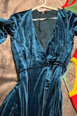 I love this dress. I'm fairly tall (5'10) and slim (132lbs).

I typically have difficulty finding long dresses for me but this dress is truly floor length. The wrap around waist is comfortable. The material itself also has a little stretch.

I especially love how warm this velvet dress is. It's perfect for winter.

I'll be wearing this dress regularly - Vanessa A.