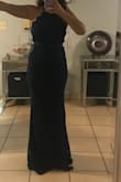 Havent worn it for my event yet. But the dress fits perfectly I need to make no changes. And hides the tummy just a bit. Would totally recommend - Fabiola R.