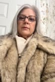 I love this jacket! I ordered several to try, from Nordstrom and Abercrombie & Fitch, and this coat was by far, the best quality! It mimicks the softness of real fur without the wildlife impact. It has hook closures which are easily concealed so as not to ruin the aesthetics of the coat. It is extremely warm and I get tons of compliments. Love this purchase! - Melanie N.