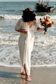 I bought this dress for my late October beach elopement. I wanted something affordable, and I fully planned on frolicking in the waves and sand while in this dress. It fit perfectly, was breathable for a warm October day, and I machine washed and air dried it after all was said and done. Overall quality was great and it shipped to me in a week or less. - Kristen C.