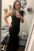 The price was right on this dress, so I wasn't expecting much, but it was perfect. Thick, stretchy fabric & the shoulder piece looks just like the photo. The fabric held me in tightly and still felt comfortable, the wedding was after 3 Christmas dinners. I am 5'3 so I needed to have it hemmed. - Mikaela A.